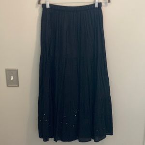 Black 3 tiered skirt with detail at bottom. Size small